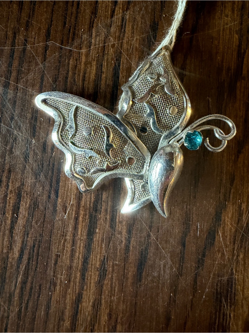 Silver-Tone Filigree Butterfly Pendant with Teal Stone